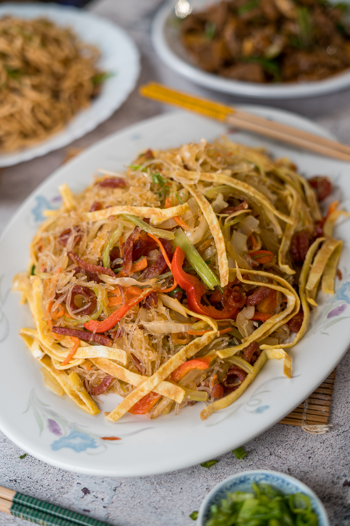This delicious Home-Style Stir Fried Rice Vermicelli is going to wok your world. Made up of slurp-worthy rice vermicelli, crunchy vegetables, and delicate ribbons of egg, this unique noodle dish makes the perfect side dish or meal on its own. Read on for the full recipe!